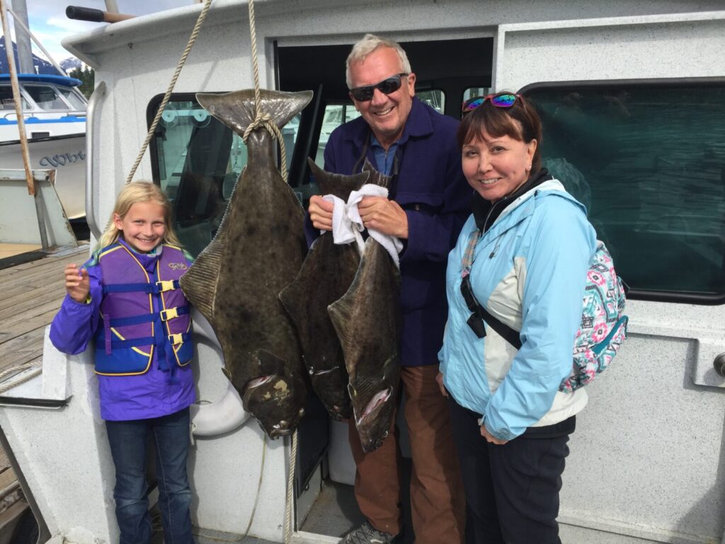 Family with fish catch